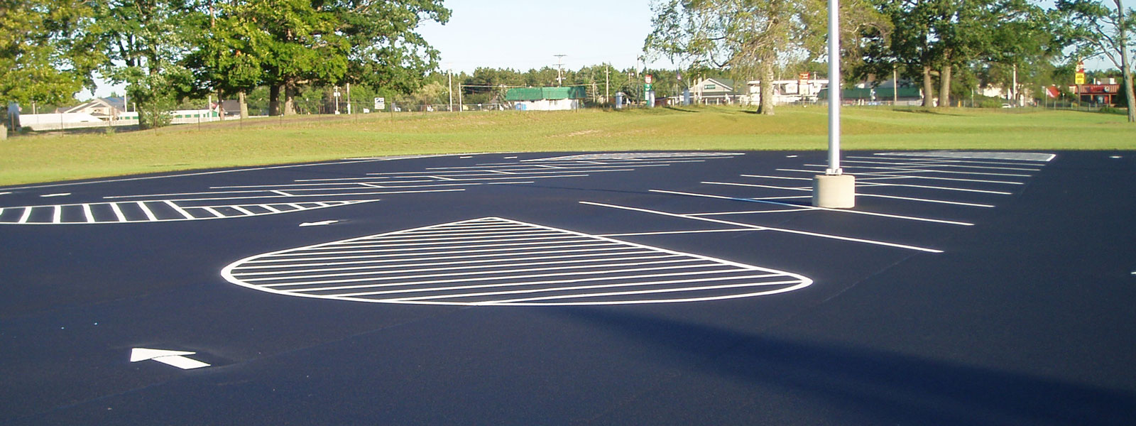 parking lot asphalt sealing and striping services in mason and manistee counties and surrounding areas.