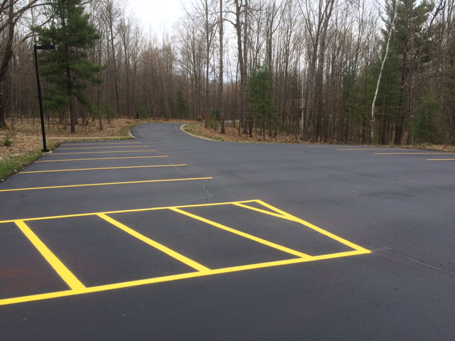 New Sealcoating and Striping in Parking Lots parking lot blacktop seal coating and striping services by brian's superior sealcoating in Manistee County michigan
